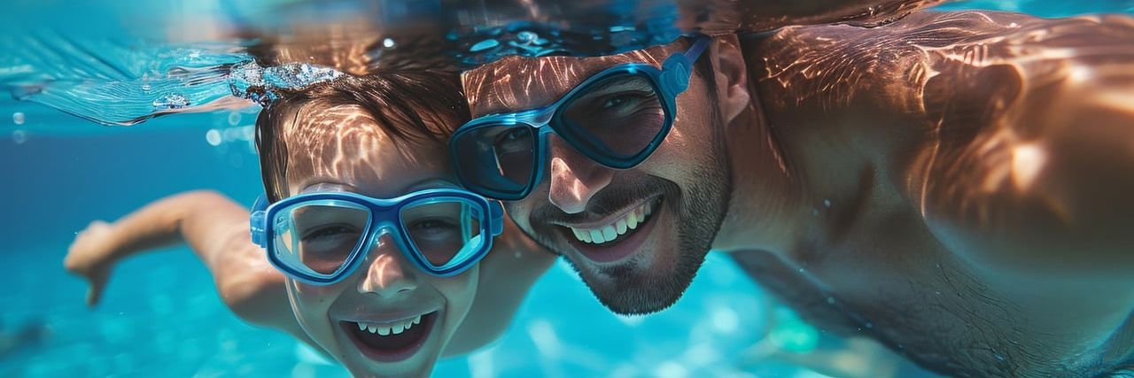 Illustration far og søn dykker under vand